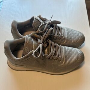 Nike silver embossed internationalist Sneakers